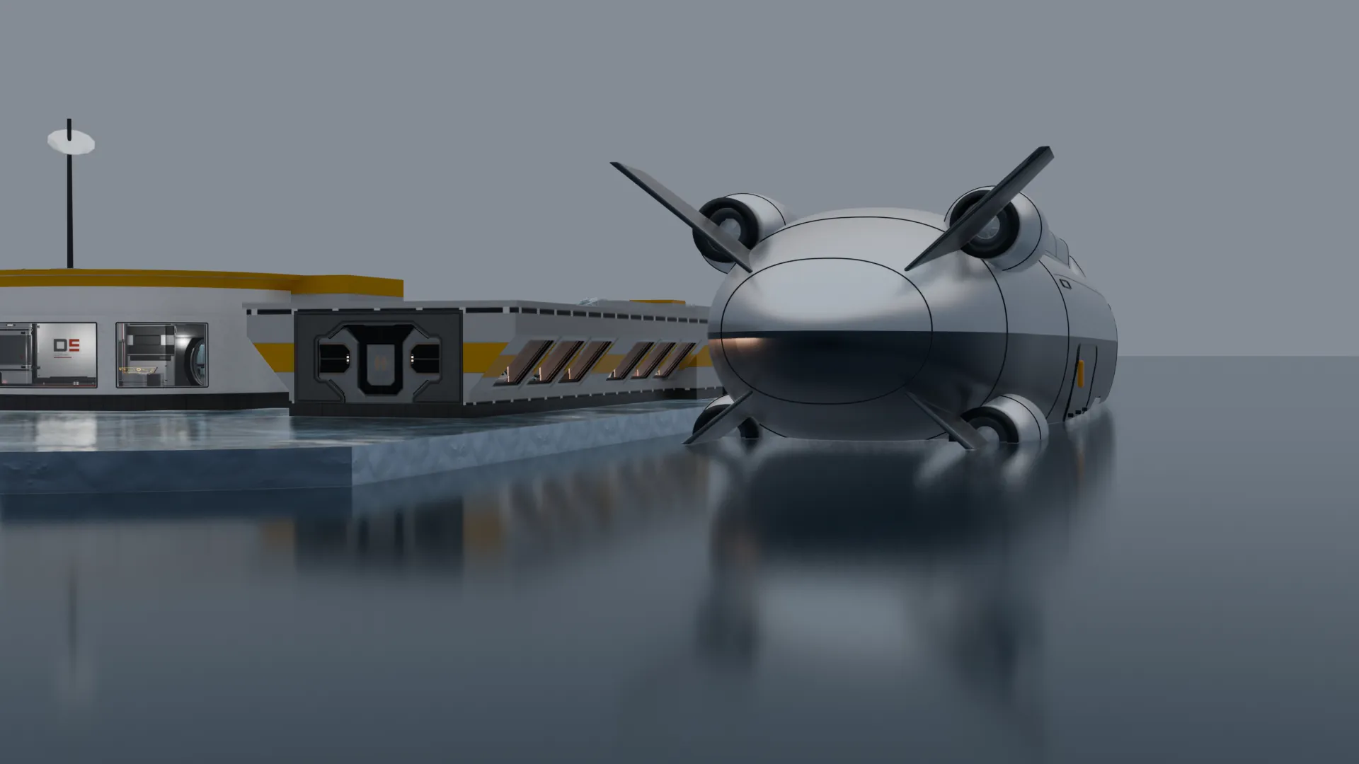 A grey carrier submarine moored bow-on at a low station on the ice, under an overcast sky.